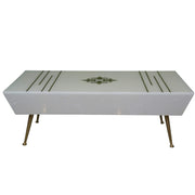 Mercy Coffee Table showcases geometric gold line details, a central medallion inlay and tapered gold legs.