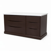 Brown dresser with white top on a white background