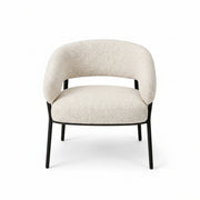 Beige armchair with black legs on a white background