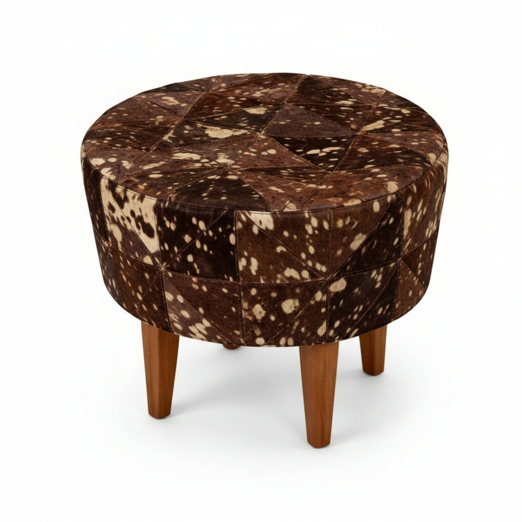 Round ottoman with brown and white patchwork pattern on a white background