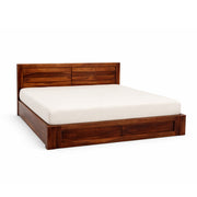 Wooden bed frame with white mattress on a white background