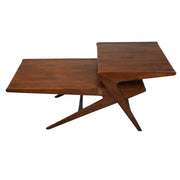 Rocket Coffee Table’s lower elongated tier transitioning into a raised upper platform is depicted.