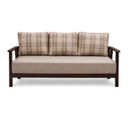 Sofa with plaid cushions on a white background