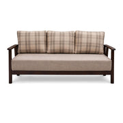 Sofa with plaid cushions on a white background