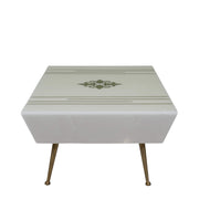 Mercy Coffee Table is available with a rectangular table's angled, blocky base silhouette and the symmetry of its tapered legs.