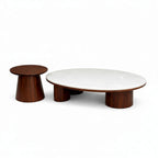 Two wooden tables, one round and one cylindrical, on a white background