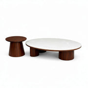 Two wooden tables, one round and one cylindrical, on a white background