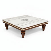 Wooden coffee table with a white marble top on a white background