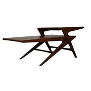 Rocket Coffee Table’s sharp geometric lines and dynamic structural framework of the wooden legs are highlighted.