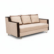 Beige sofa with quilted design and brown cushions on a white background