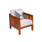 Wooden armchair with white cushion and checkered pillow on a white background