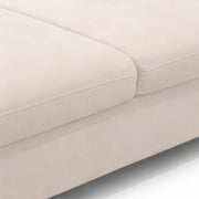 Elton Divider’s seamless stitching and soft texture of the cream fabric upholstery along the cushion seam make it elegantly beautiful.
