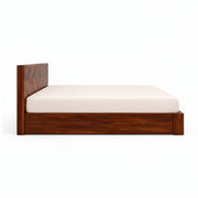 Wooden bed frame with a white mattress on a white background