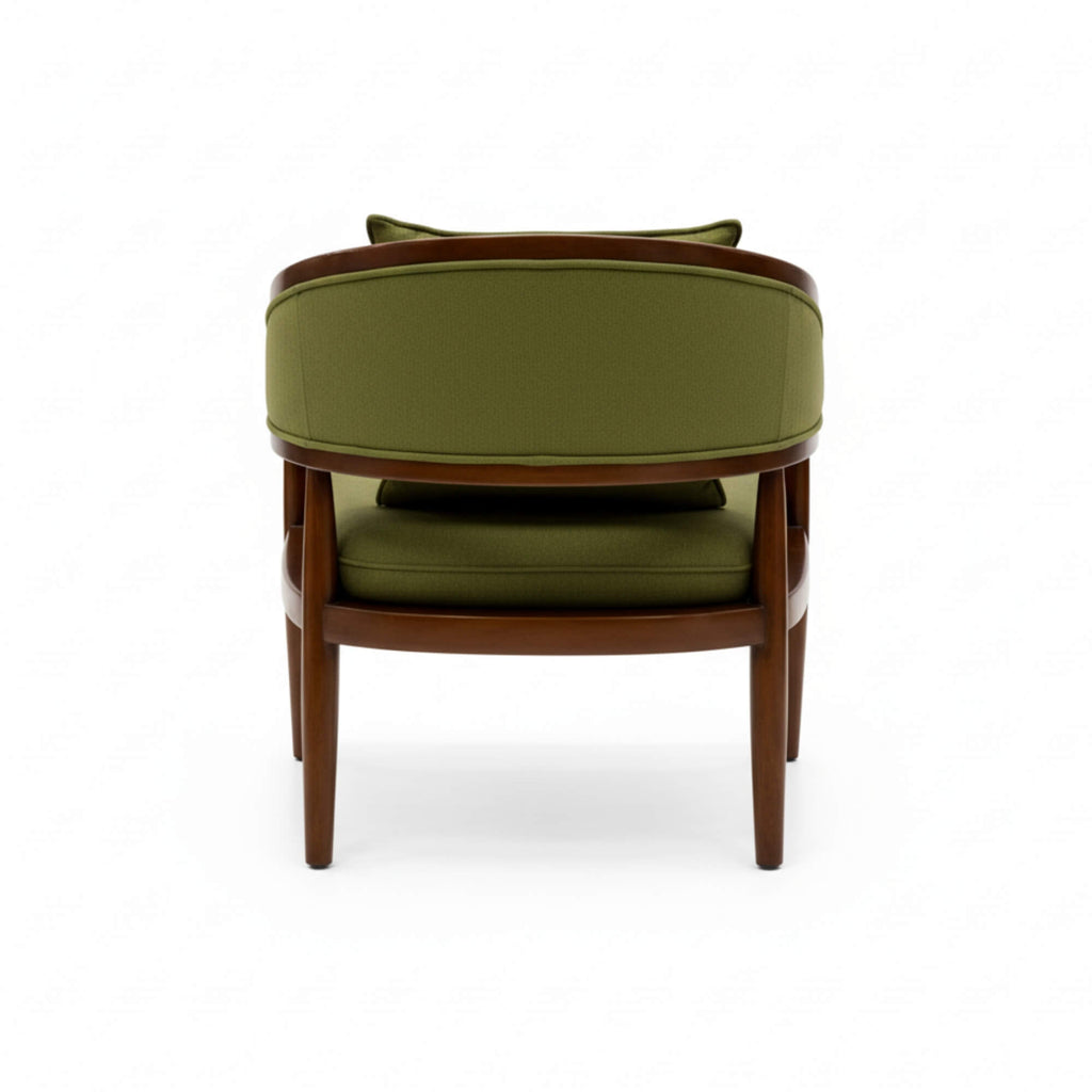 Green armchair with wooden frame on a white background