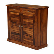 Wooden cabinet with two doors and two drawers on a white background