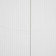 Close-up of a white tiled wall with horizontal lines