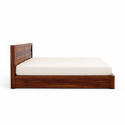 Wooden bed frame with white mattress on a white background