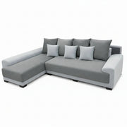 Gray sectional sofa with cushions on a white background