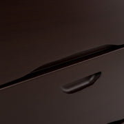 Close-up of a dark brown leather surface with a subtle texture