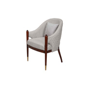 Chair with quilted backrest and wooden legs on a white background