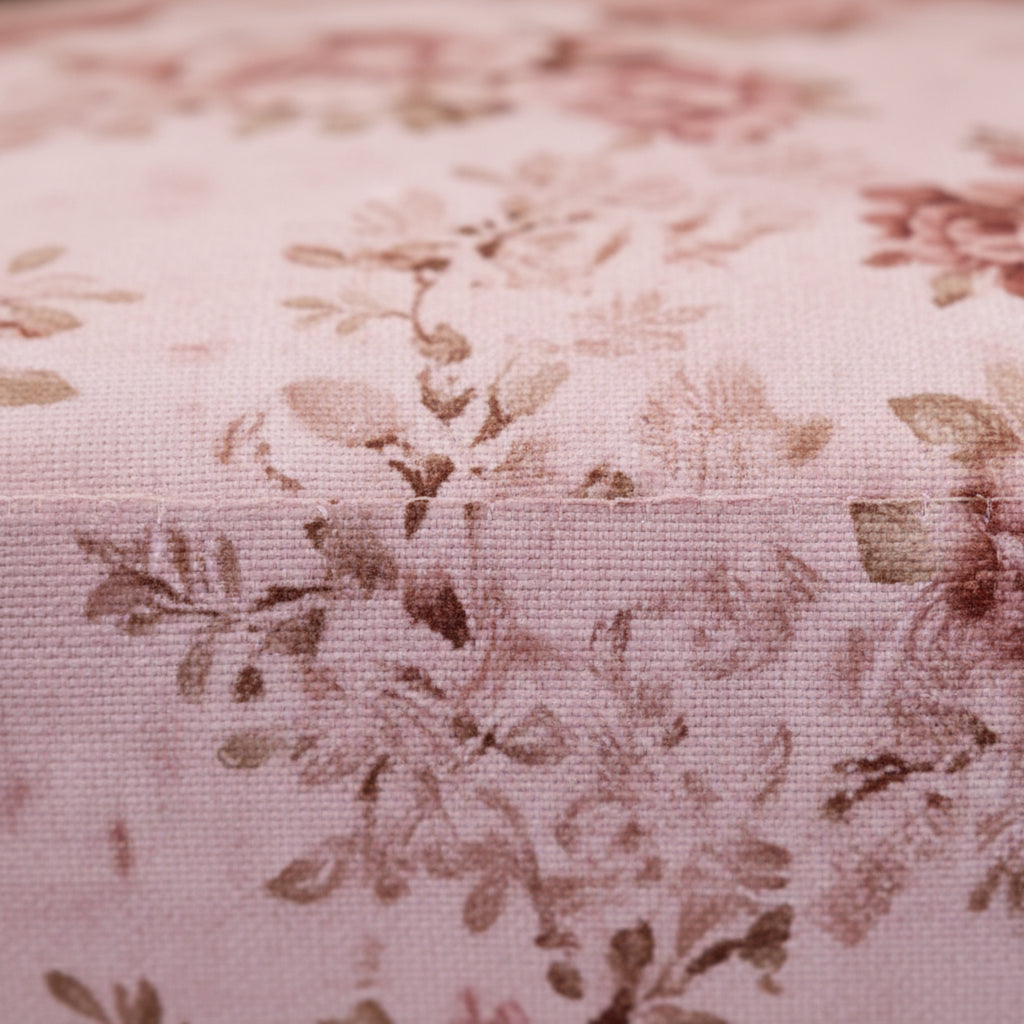 Close-up of floral fabric with a pinkish-brown color scheme