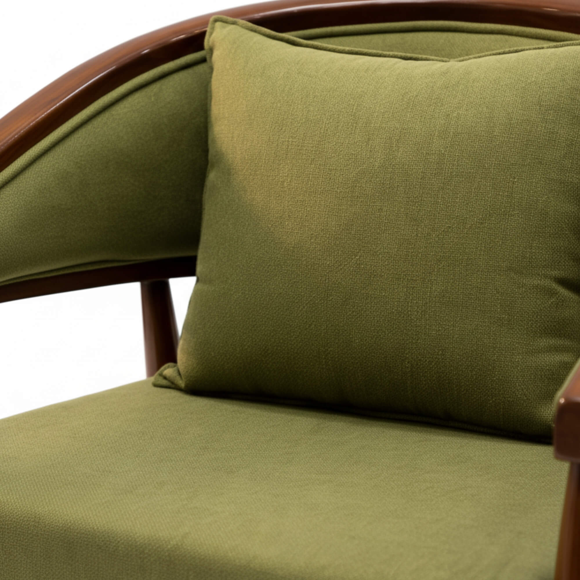 Green cushion on a wooden chair with a white background
