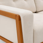 Beige sofa with wooden armrests on a white background