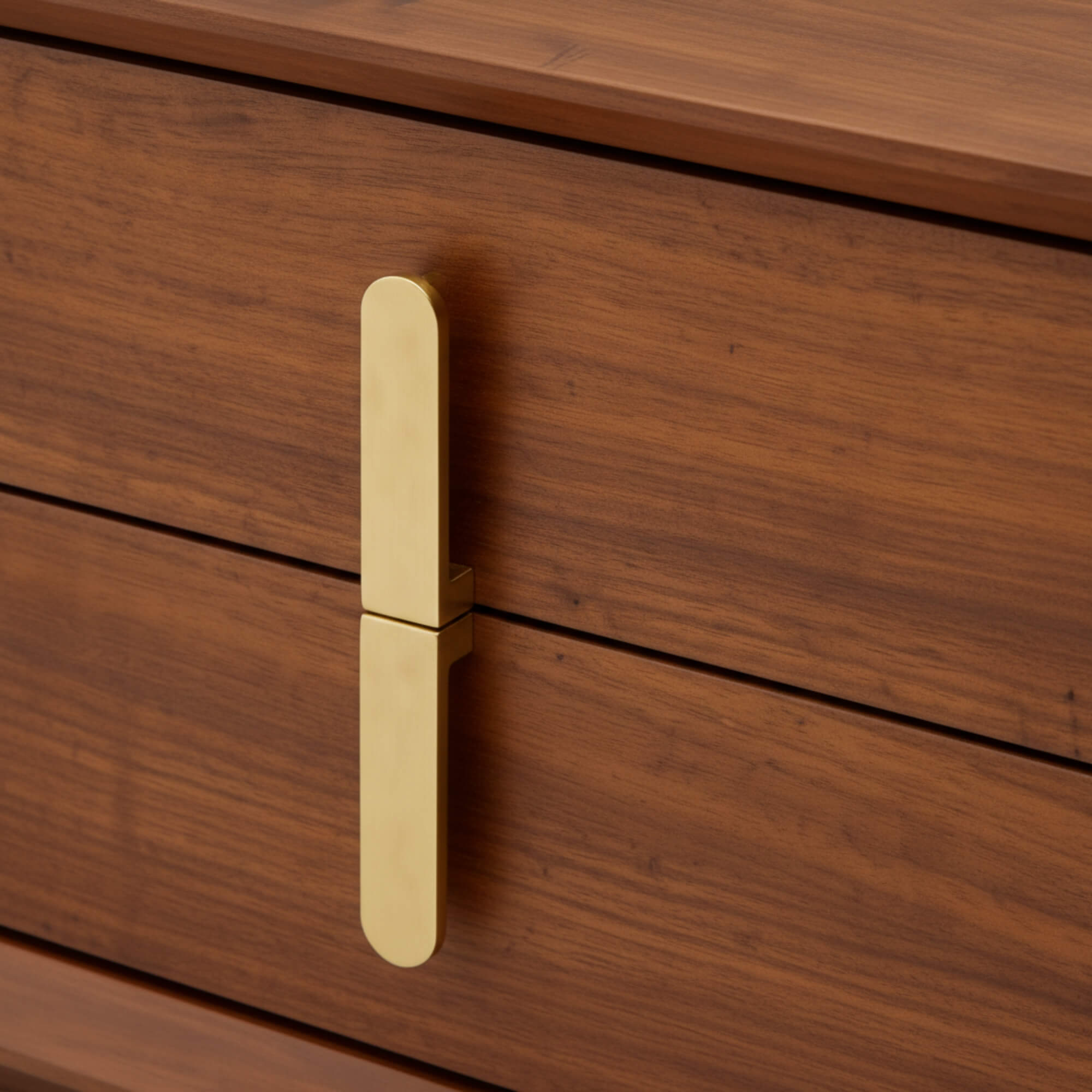 Wooden drawer with a gold handle