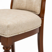 Drum dining chair cushioned seat close-up