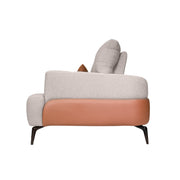 Modern armchair with beige cushioned backrest and brown leather armrests 