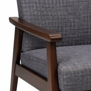 Gray upholstered chair with wooden armrest on a white background