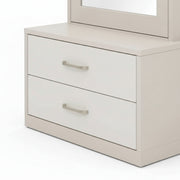 Beige dresser with two drawers and a mirror on top against a white background