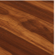 Close-up of a wooden surface with visible grain and texture