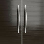 Pair of metallic handles on a dark wooden door