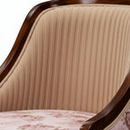 Close-up of a beige textured chair cushion with floral patterned fabric.