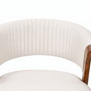 Close-up of a chair with white cushioned backrest and wooden armrests on a white background