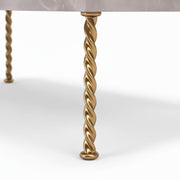 Aspire Coffee Table exhibit an intricate, twisted rope design of the metallic gold legs beneath the thin overhang of the tabletop, which is complemented by a gold leg to make it elegant.