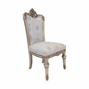Mace carved dining chair, three-quarter view