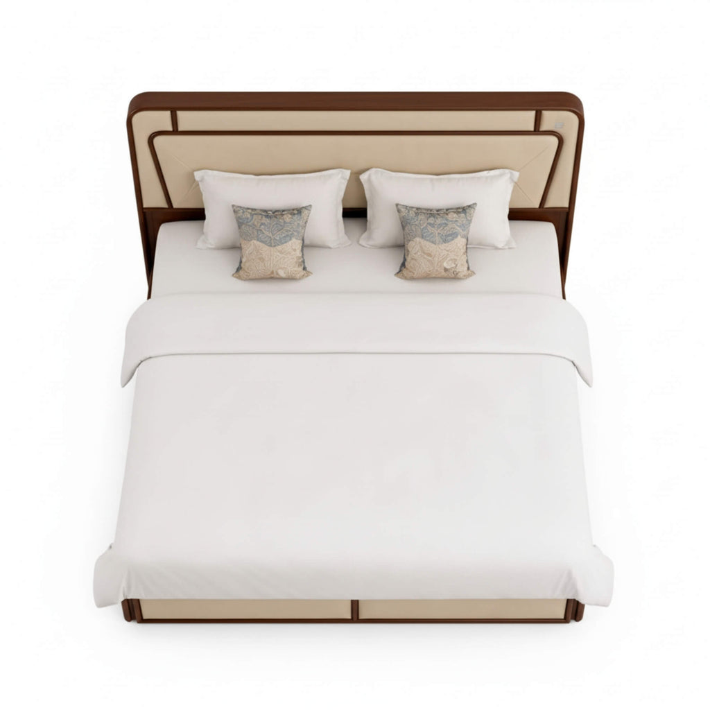 Bed with white bedding and decorative pillows on a white background