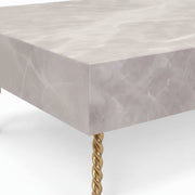 Aspire Coffee Table’s crisp edges and stone finish of the blocky tabletop corner make it elegant.
