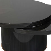 N302A Coffee Table features mechanical swivel overlap and the seamless curved edges connecting the gloss black tiers.