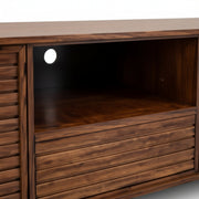 Wooden entertainment console with a dark glass front