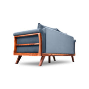 Gray sofa with wooden frame on a white background