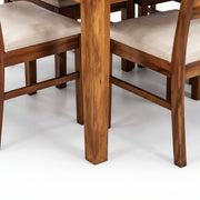Diamond solid wood table and chair legs close-up