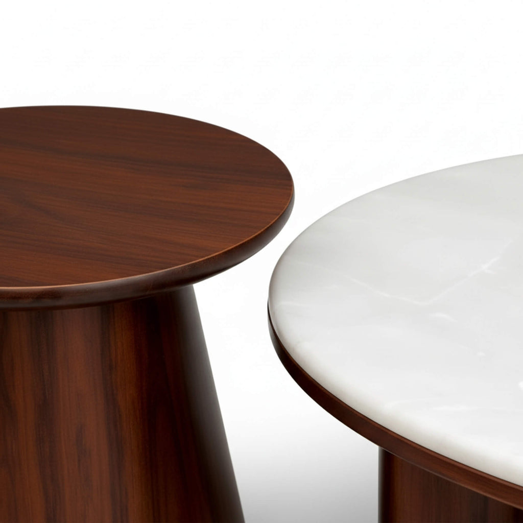 Two round tables, one wooden and one with a white surface, on a white background.