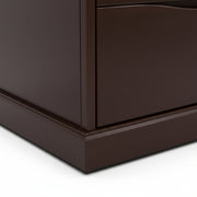 Close-up of a dark brown wooden drawer on a white background