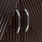 Close-up of a brown cabinet with silver handles