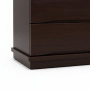 Dark brown wooden dresser with two drawers on a white background
