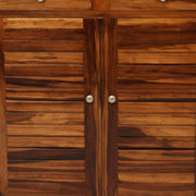 Close-up of a wooden wardrobe with slatted doors and metallic handles.