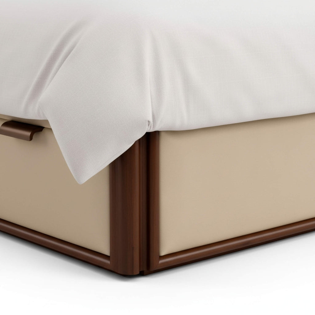 Beige bed frame with white bedding on a light background